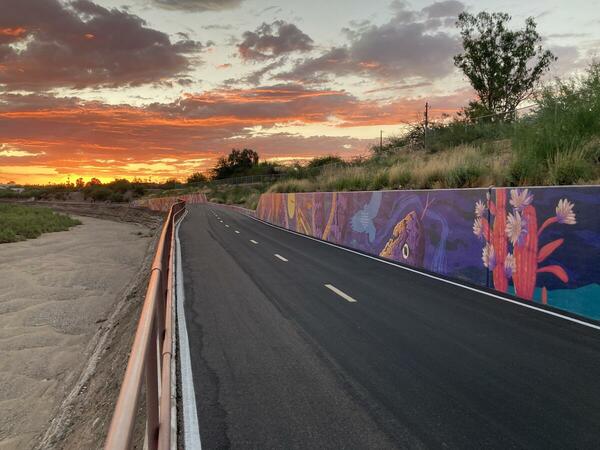rillito river walking and biking path with mural in tucson