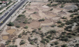 Aerial photo of the CDO restoration site with water captured in basins.