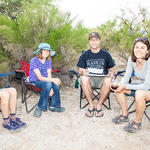 WMG friends relaxing in their camping chairs. 