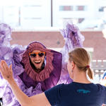 A tutu-clad WMG supporter and former staff member Stephen Thomas