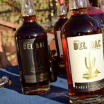 Golden hour with bottles of whiskey.