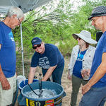 WMG's Public Relations Manager Jamie Manser pumps the keg, provided by Borderlands Brewing Co.