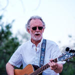 John Corrin on guitar and vocals with The Coots