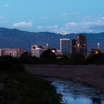 The Santa Cruz and downtown Tucson at dusk. Photo by Julius Schlosburg