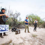 Musician Carlos Arzate with Joaquin and Lisa.