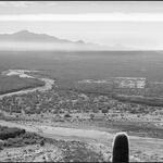 A black-and-white photo of a historic river.