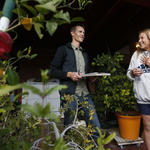 Catlow Shipek advises Ronni Kotwica about water harvesting and landscaping at her midtown home, which is has been inundated with accumulated rainfall accumulation and runoff.