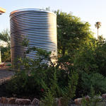 Waterharvesting cistern and earthworks at a Tucson home.
