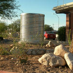 Rain tank installation for active water harvesting.