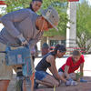 Students constructing schoolyard rain garden