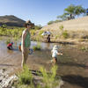 Happy kids & adults at the Santa Cruz River release! Photo by Nicci Radhe