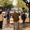 a group of students learning about rainwater harvesting outdoors
